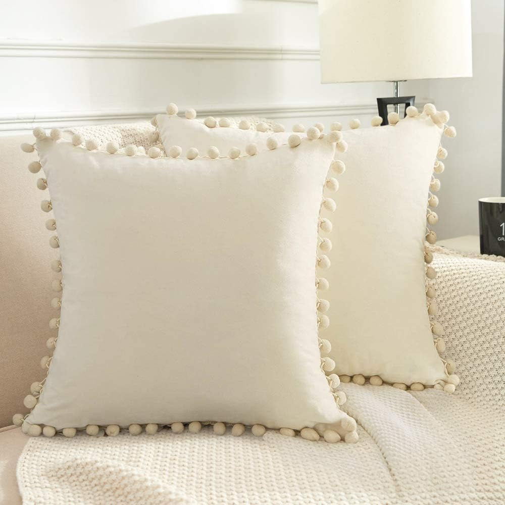 Elegant Velvet Throw Pillow Covers with Pom Poms, Set of 2, 18x18 Cream White Cushion Cases for Couch, Bedroom, Car, and Outdoor Use